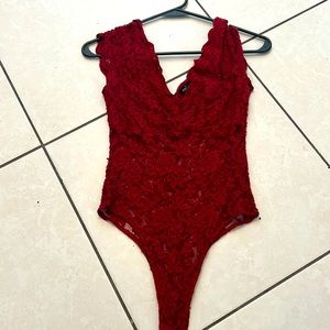 Lace red body suit